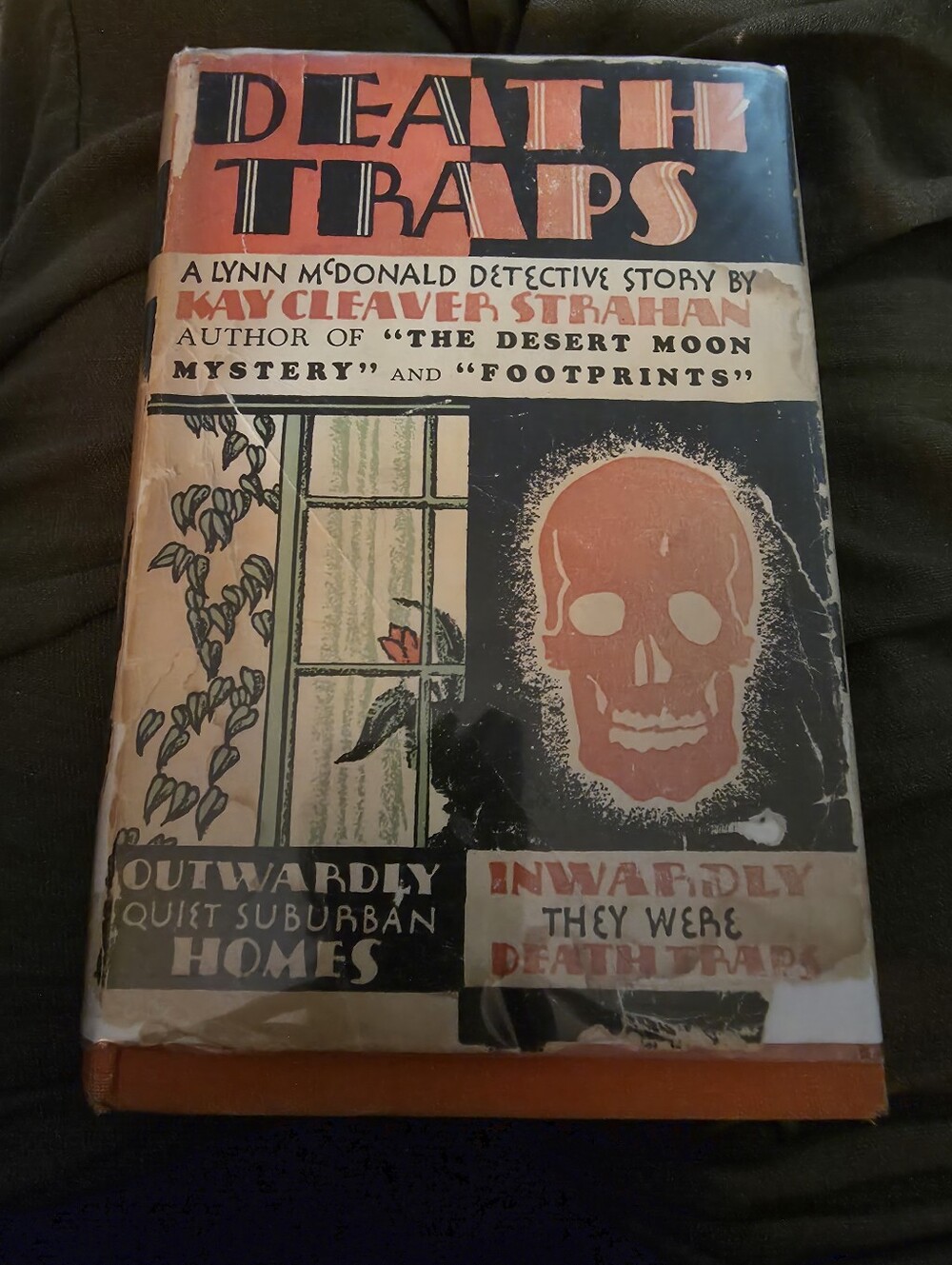 Vntage copy of the mystery novel Death Traps by Kay Cleaver Strahan.